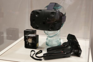 The HTC Vive HMD with controllers and "Light House" Sensors